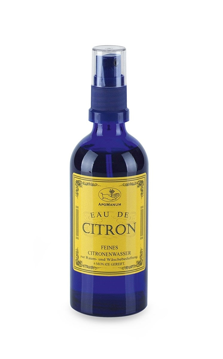 Apomanum Eau de Citron – blaue Sprayflasche mit gelbem Etikett, weißer Hintergrund – Raumduft