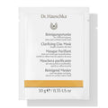 Dr. Hauschka Reinigungsmaske Sachet 10g, weißes Beutelchen mit goldener Leiste, weißer Hintergrund – Hautpflege