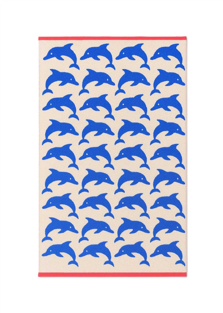 Jumping Dolphins Organic Cotton Badetuch – cremefarben mit blauen Delfinen und rotem Rand – Strandtuch