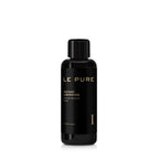 LE PURE Instant Liberation – schwarze Flasche mit schwarzem Deckel, weißer Hintergrund – Gesichtsmaske