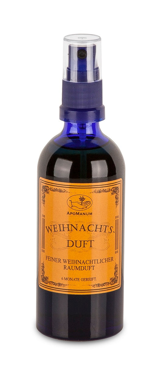 Apomanum Weihnachtsduft – blaue Sprühflasche mit goldetikett, weißem Hintergrund – Raumduft