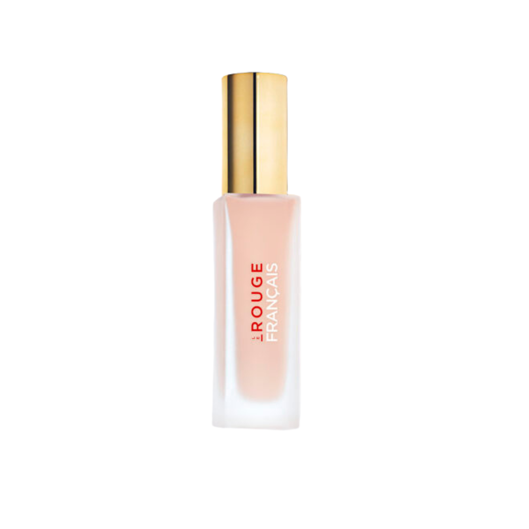 Le Rouge Français Le Fluide de Teint – durchsichtige Flasche mit goldener Kappe, weißer Hintergrund – Make-up