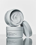 (M)ANASI 7 Botanical Body Cream Calantha – grey jar 100ml, open, white background – body care