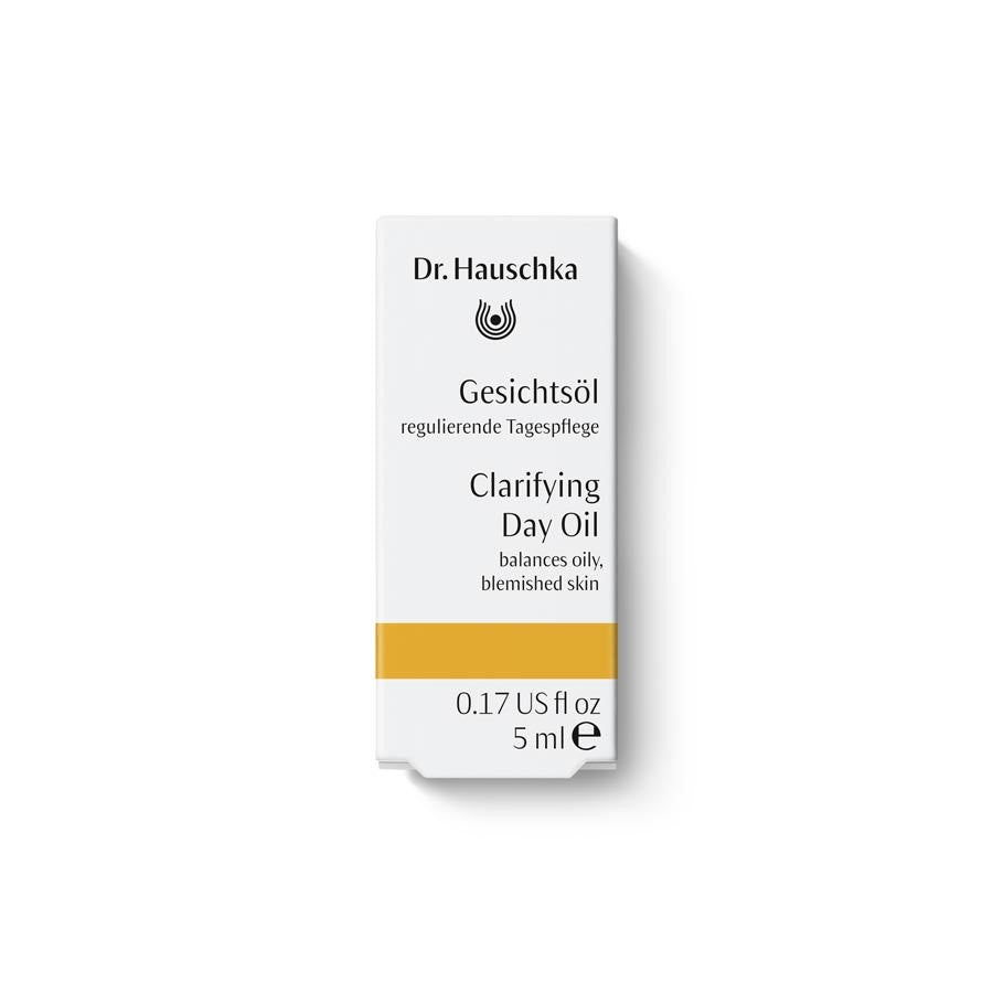 Dr. Hauschka Gesichtsöl – weißes Karton 5 ml, goldener Streifen, weißer Hintergrund – Hautpflege