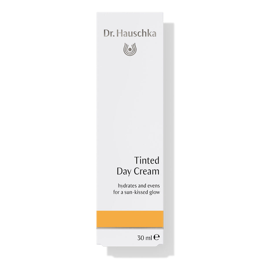 Dr. Hauschka Tönungscreme – weiße Tube 30 ml, orangefarbener Streifen, weißer Hintergrund – Gesichtspflege