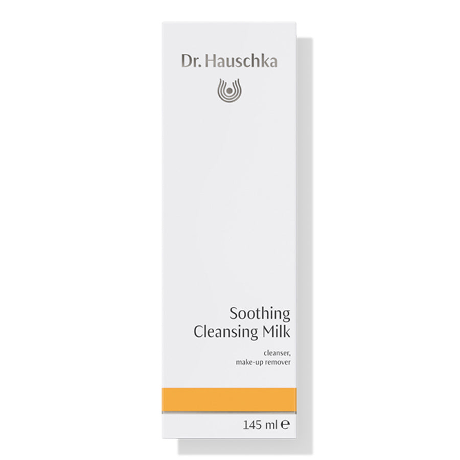 Dr. Hauschka Reinigungsmilch – weiße Kartonverpackung 145 ml, orangefarbener Streifen, weißer Hintergrund – Gesichtspflege