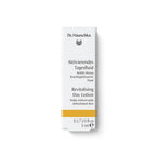 Dr. Hauschka Aktivierendes Tagesfluid – 5 ml Probiergröße, weißes Karton mit goldener Linie, weißer Hintergrund – Hautpflege