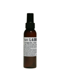 L:A BRUKET No. 290 Firming Body Serum – amber glass bottle with spray nozzle, white label, black cap – body care