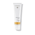Dr. Hauschka Aufbauende Maske – weiße Tube mit goldener Linie, weißem Deckel, weißem Hintergrund – Hautpflege