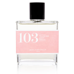 Bon Parfumeur 103 Tiaré Parfum in einer Glasflasche mit schwarzem Verschluss und rosa Etikett auf weißem Grund.