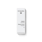 Dr. Hauschka Lipstick 13 Bromelia – weißes Kartonpaket 4,1 g, weißer Hintergrund – Lippenpflege