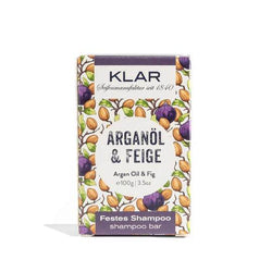 KLAR Festes Shampoo Arganöl & Feige – 100g, lila-weiße Verpackung mit Nüssen und Feigen, weißer Hintergrund – Haarpflege