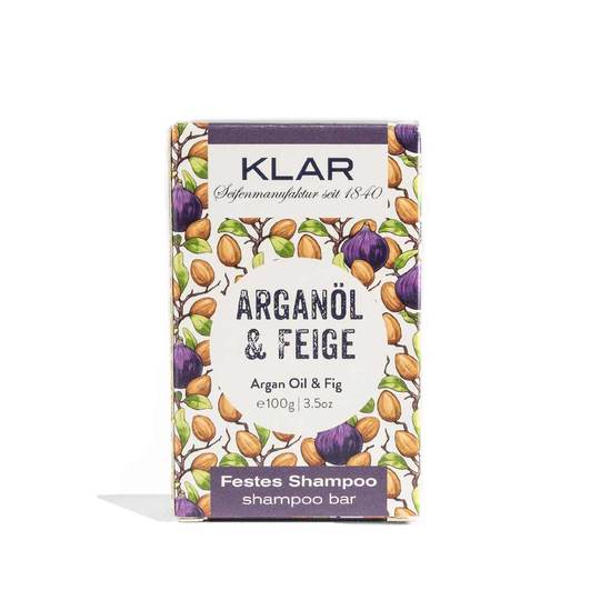 KLAR Festes Shampoo Arganöl & Feige – 100g, lila-weiße Verpackung mit Nüssen und Feigen, weißer Hintergrund – Haarpflege