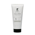 grums Raw Coffee Body Scrub – weiße Tube mit schwarzen Punkten, schwarzer Verschluss, weißem Hintergrund – Körperpeeling