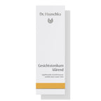 Dr. Hauschka Gesichtstonikum klärend – weißes Kartonpaket mit goldener Linie, weißer Hintergrund – Hautpflege