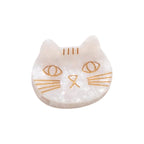 Saltwater Kitty Cat White Hair Clip – cat-shaped hair clip made of mother-of-pearl with gold accents, white background – hair accessories