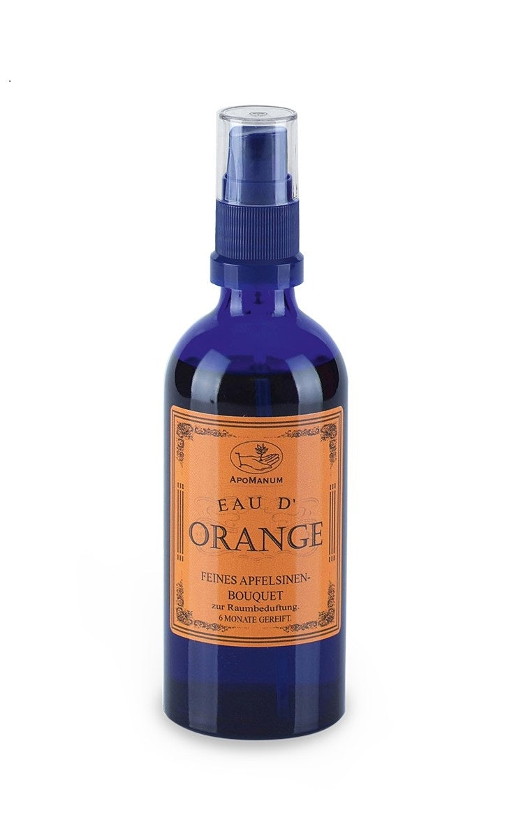 Apomanum Eau d'Orange – blaue Sprayflasche mit orangefarbenem Etikett, weißer Hintergrund – Raumduft