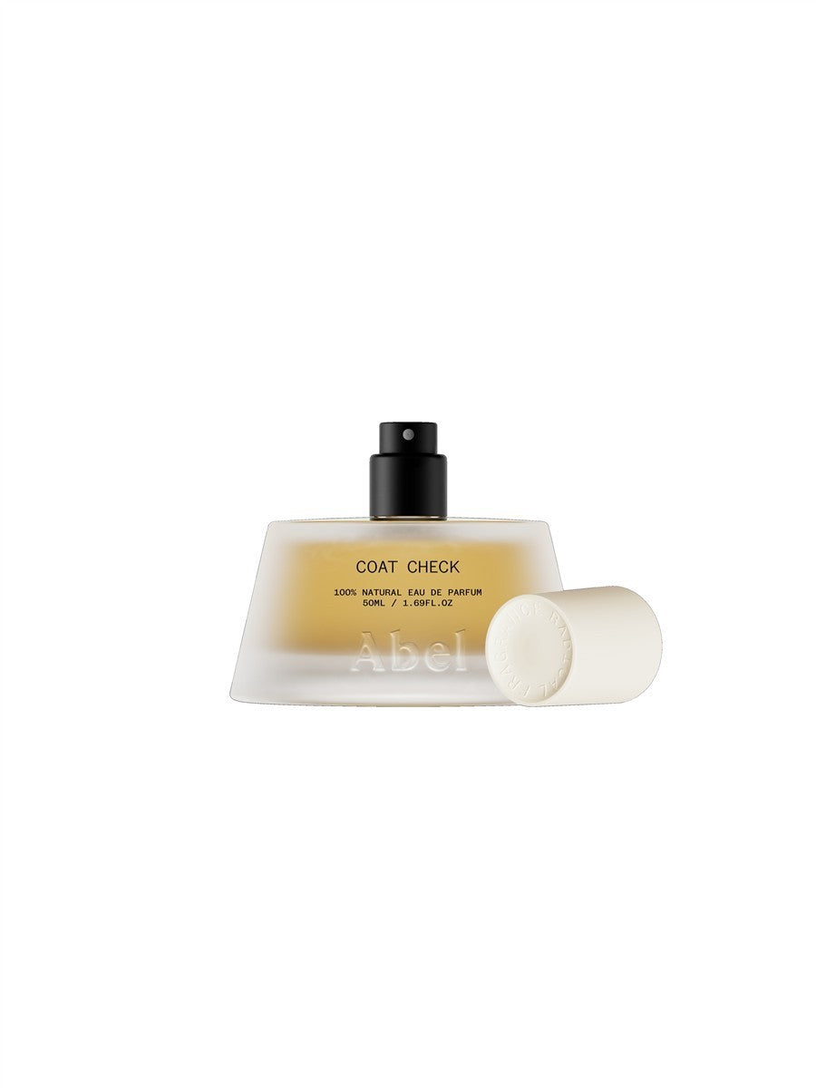 Abel Coat Check Eau de Parfum – 50ml Sprayflasche, cremefarbenes Glas, schwarzer Zerstäuber, weißer Hintergrund – Parfüm