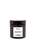 No. 314 Kerze Grapefruit – braunes Glasgefäß 50g, schwarzer Deckel, weißer Hintergrund – Duftkerze