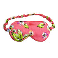 Le Flora sleep mask in pink with floral pattern and elastic band.