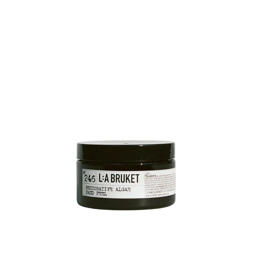 L:A BRUKET No. 246 Restorative Algae Hand Peel – schwarzer Glasbehälter 100ml, schwarzer Deckel, weißer Hintergrund – Handpflege
