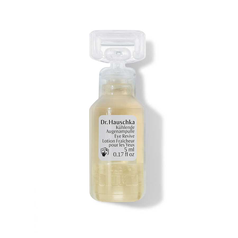 Dr. Hauschka Kühlende Augenampulle 5ml – transparente Ampulle mit Dosierpumpe, weißem Etikett und weißem Hintergrund – Augenpflege