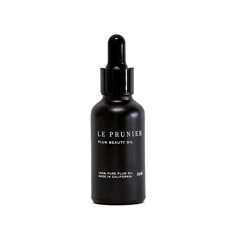 Le Prunier Plum Beauty Oil – schwarze Glasflasche mit Tropfer, 30ml, weißer Hintergrund – Hautpflege