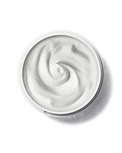Botanical Face Cream Furora – weißer Tiegel mit cremiger Textur, weißer Hintergrund – Gesichtspflege