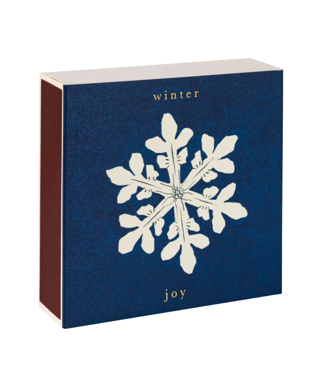 Winter Joy gift box – dark blue packaging with white snowflake design, gold text, white background – skin care