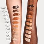 Skin Equal Soft Glow Foundation, texture swatches of various shades on two different skin tones.