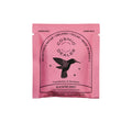 Cosmic Alchemy Dealer Himbeere mit Macadamia – rosa Einwegbeutel, weißer Hintergrund – vegane Schokolade