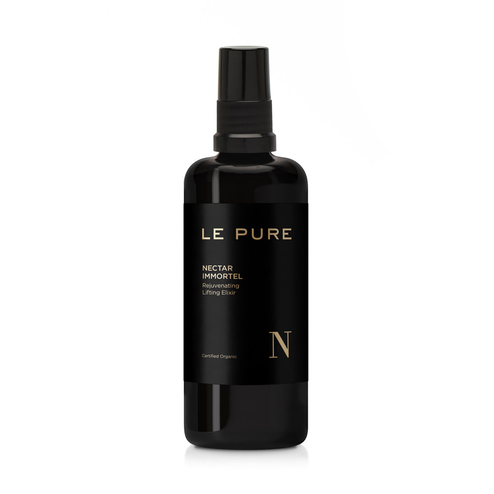 LE PURE Nectar Immortel – schwarze Sprayflasche mit goldener Beschriftung, weißem Hintergrund – Hautpflege