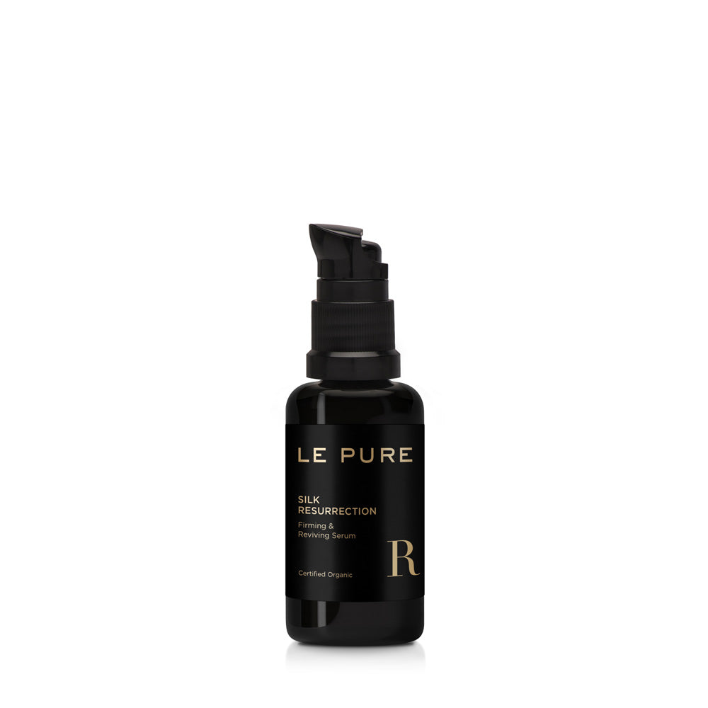 LE PURE Silk Resurrection – schwarze Glasflasche 30ml mit Pumpverschluss, weißer Hintergrund – Serum