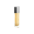 Kjaer Weis The Cleanser – durchsichtige Flasche mit silber-schwarzem Deckel, weißem Hintergrund – Hautreinigung
