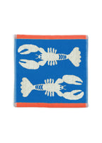 Lobster Blue Organic Cotton Washcloth – blue with white lobsters, orange border, white background – facial cleansing