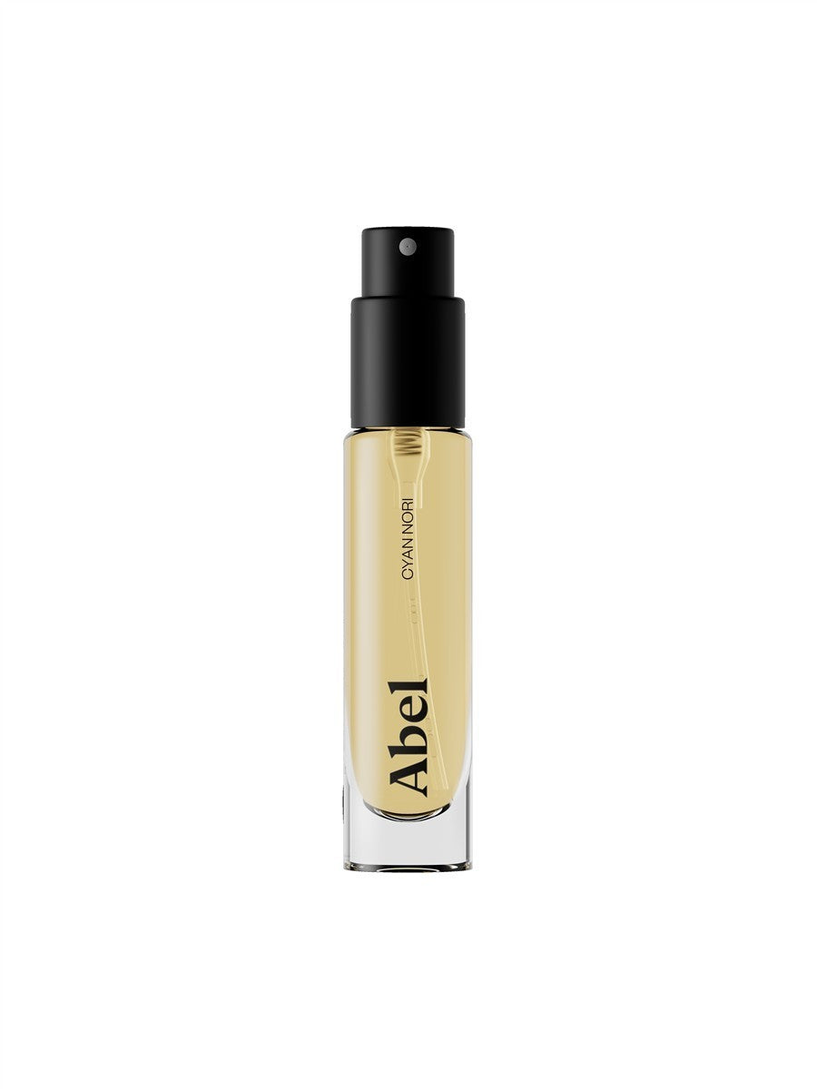 Abel Cyan Nori Eau de Parfum – clear glass bottle with black spray nozzle, white background – perfume