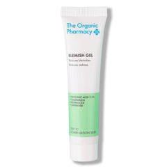 The Organic Pharmacy Blemish Gel in einer weißen Tube mit grünem Detail auf weißem Grund, Hautpflege.