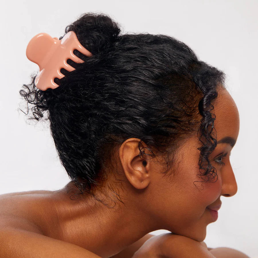 Puffy Claw Clip Large – peach hair clip in bun, white background – hair styling