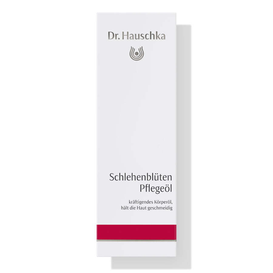 Dr. Hauschka Schlehenblüten Pflegeöl – weißes Kartonpaket mit rotem Streifen, weißer Hintergrund – Körperpflege