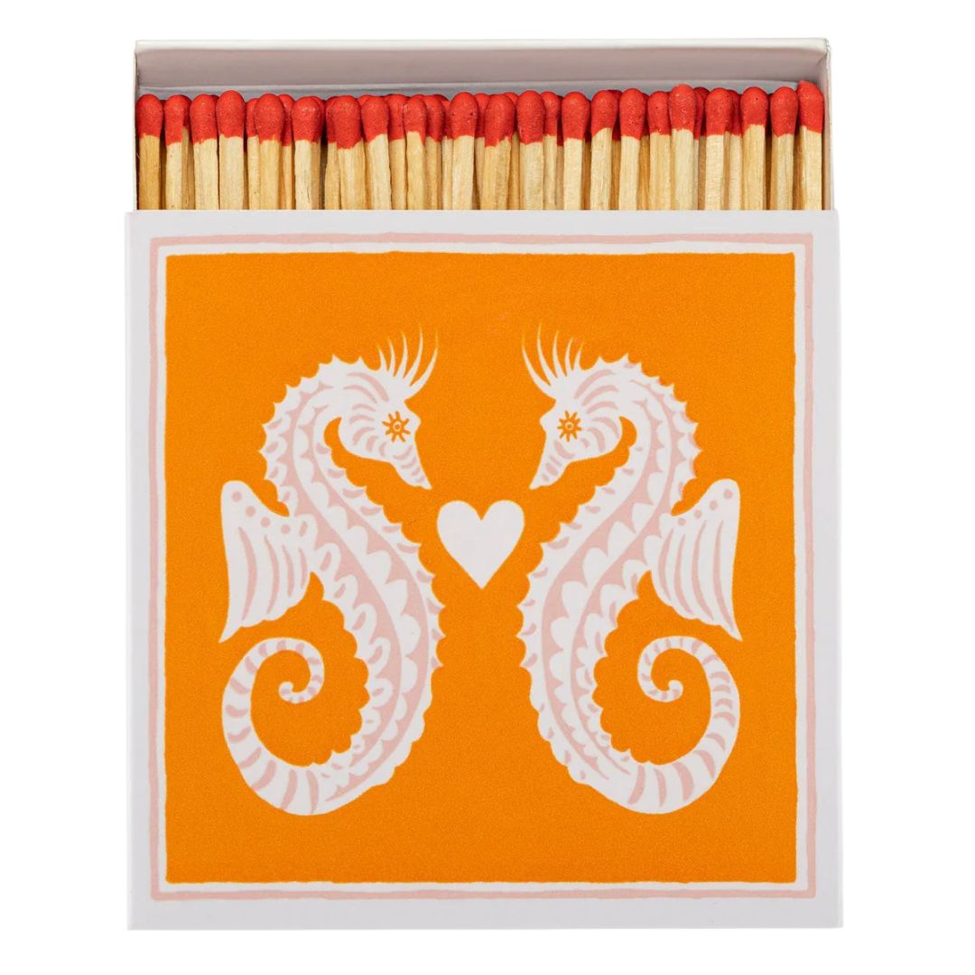 Seahorse Matchbox – orange packaging with white seahorses, white background – decor