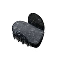 Haarklammer Herz Onyx – black marbled heart-shaped hair clip on white background – hair styling