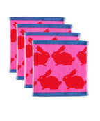Kissing Rabbits Organic Cotton Face Cloth – pink with red rabbits, blue border, white background – skin care