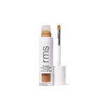 rms beauty Revitalize Hydra Concealer in beige, open with applicator on white background.