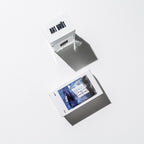 Disko Disko Parfum – clear glass bottle 50ml, white box with blue label, white background – perfume