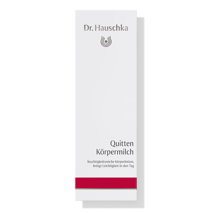 Dr. Hauschka Quitten Körpermilch – weiße Tube mit rotem Streifen, weißem Hintergrund – Körperpflege