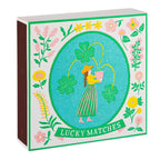 Lucky Matches – square box with floral illustration, green border, white background – decor