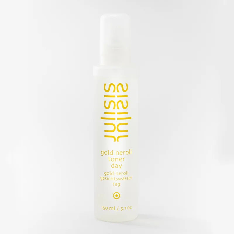 Sisley Gold Neroli Toner – durchsichtige Sprayflasche 150ml, goldene Schrift, weißer Hintergrund – Gesichtswasser