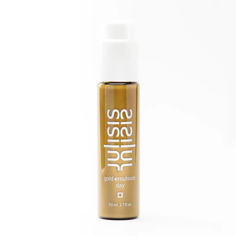 Sisley Gold Emulsion Day – goldene Flasche 50ml, weißer Pumpverschluss, weißer Hintergrund – Hautpflege