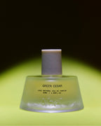 Abel Green Cedar Eau de Parfum – 50ml green glass bottle with white cap, bright green background – perfume