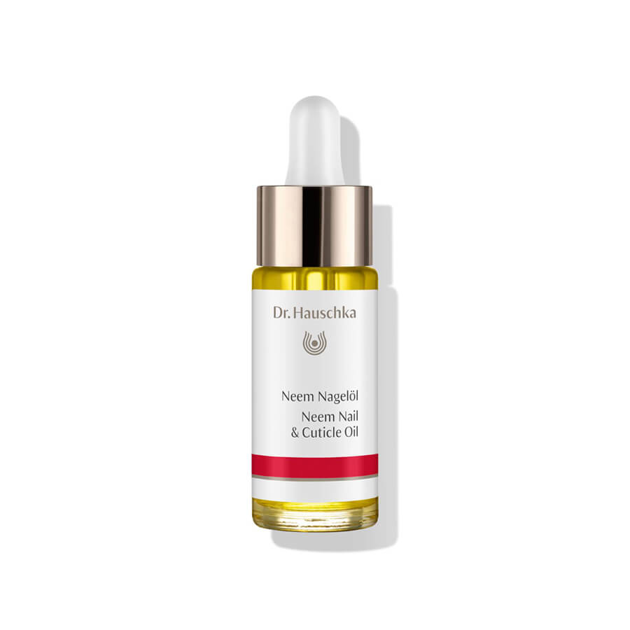 Dr. Hauschka Neem Nagelöl – Glasfläschchen mit Tropfer, weiß-rotes Etikett, goldener Ring, weißer Hintergrund – Nagelpflege